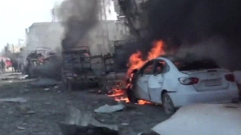 A video posted online by activists showed dozens of vehicles on fire