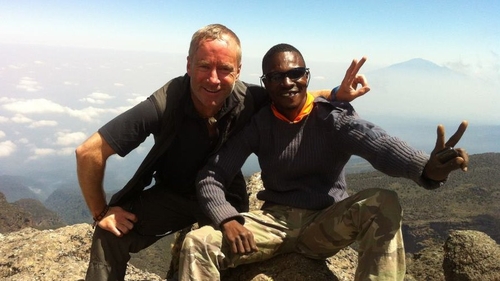 Ian McKeever pictured with a guide on Mount Kilimanjaro in July (Pic: Facebook)