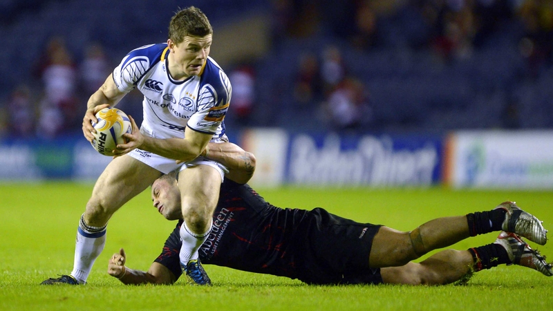 Leinster's Brian O'Driscoll eludes grasping Edinburgh centre Ben Atiga