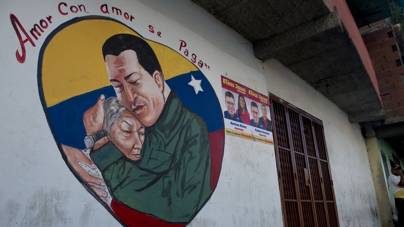 Picture of a wall with an image of Venezuelan President Hugo Chavez