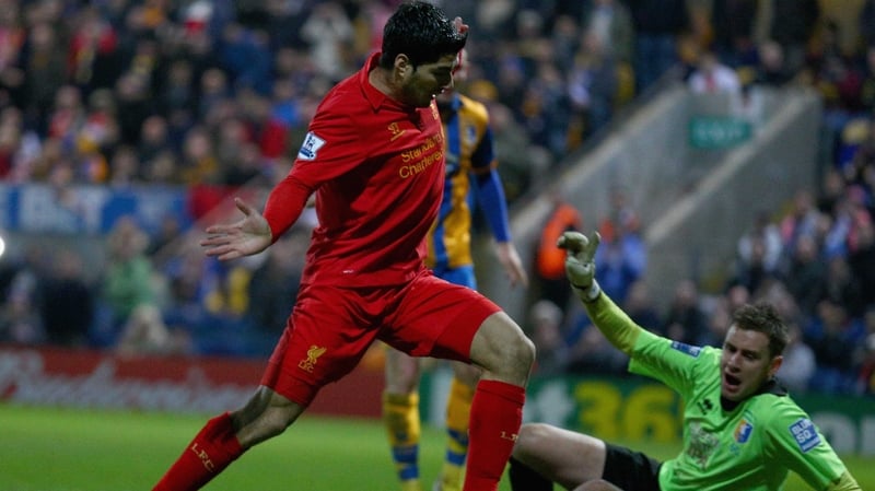 Luis Suarez scored Liverpool's second goal in a controversial manner