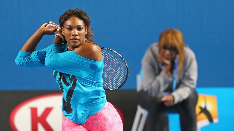 Serena Williams gets some practice in - with her mother watching on in Melbourne