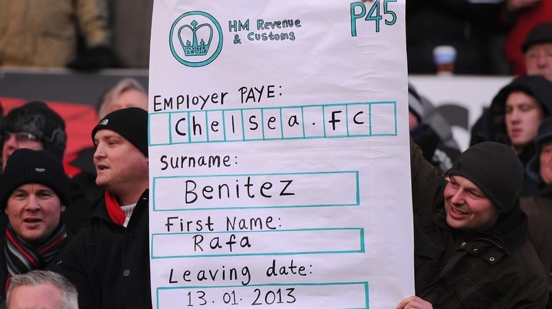 Chelsea fans with a mock P45 for manager Rafael Benitez