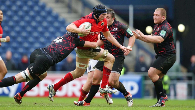 Munster's Tommy O'Donnell is tackled by Edinburgh's Grant Gilchrist