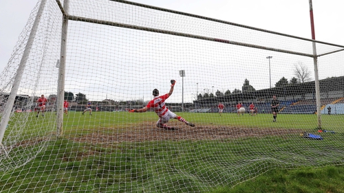Tipperary's Barry Grogan scores from the penalty spot against Cork