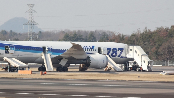 A Boeing 787 Dreamliner operated by All Nippon Airways sits on the tarmac after an emergency landing at Takamatsu Airport