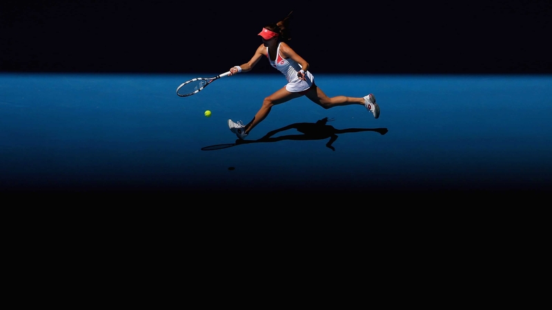 Agnieszka Radwanska plays a forehand in her second round match against Irina-Camelia Begu