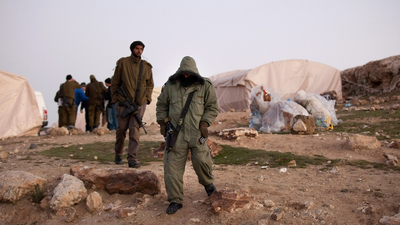 Israeli border policemen guard the Bab al-Shams (Gate of the Sun) 'outpost' after evicting Palestinian protesters from the site