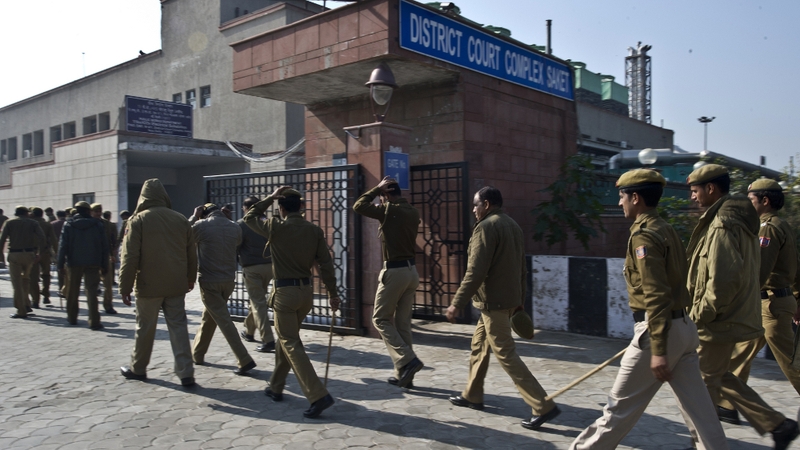 The men were read 13 charges including murder, which carries a maximum penalty of death