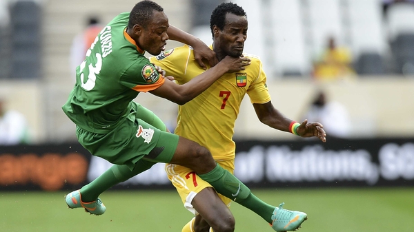 Zambia's Stoppila Sunzu gets to grips with Ethiopia's Said Ahmed