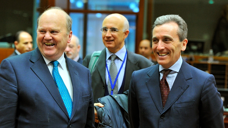 Michael Noonan and Italian Finance Minister Vittorio Grilli chat before this morning's meeting
