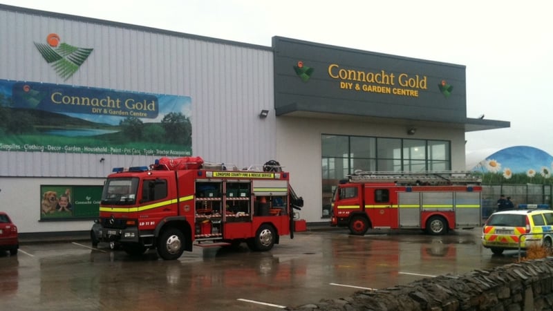 Two men died after a wall collapsed in the Connacht Gold store in Longford