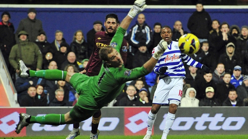 QPR's Loic Remy watches his shot go wide of Joe Hart and the Manchester City goal