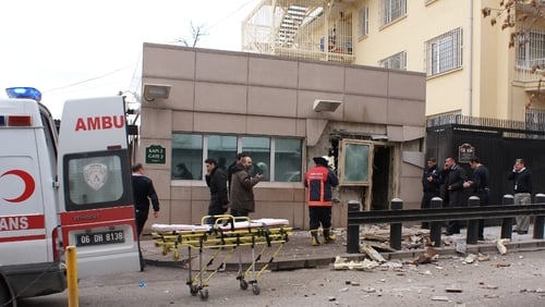 Television footage showed a door blown out and masonry from the wall around it scattered in front of the side entrance