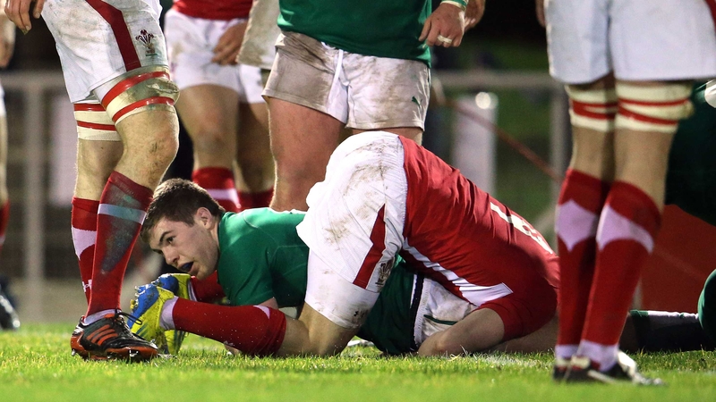Ireland's Luke McGrath scores the first try of the game in in Colwyn Bay
