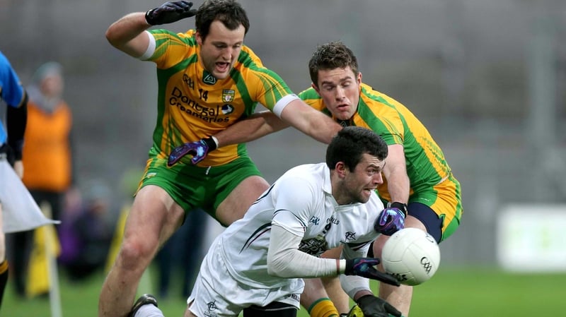 Kildare's Padraig O'Neill under pressure from Michael Murphy and Declan Walsh of Donegal
