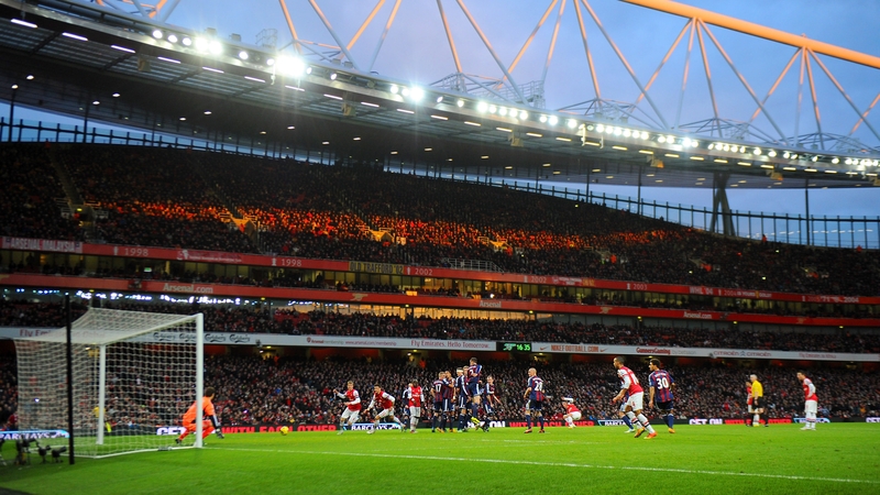 Lukas Podolski scores the winner at the Emirates