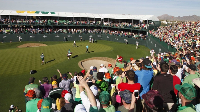 Phil Mickelson putts for victory at the Phoenix Open in Scottsdale, Arizona