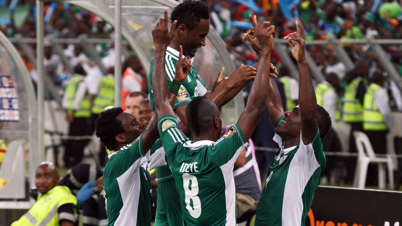 Nigeria celebrate scoring their third goal at the Moses Mabhida Stadium
