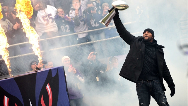Baltimore Ravens linebacker Ray channels the spirit off the WWE as he celebrates with The Vince Lombardi Trophy