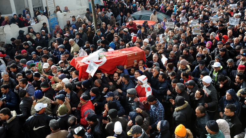 Chokri Belaid's coffin is carried through the streets of Jebel al-Jaloud