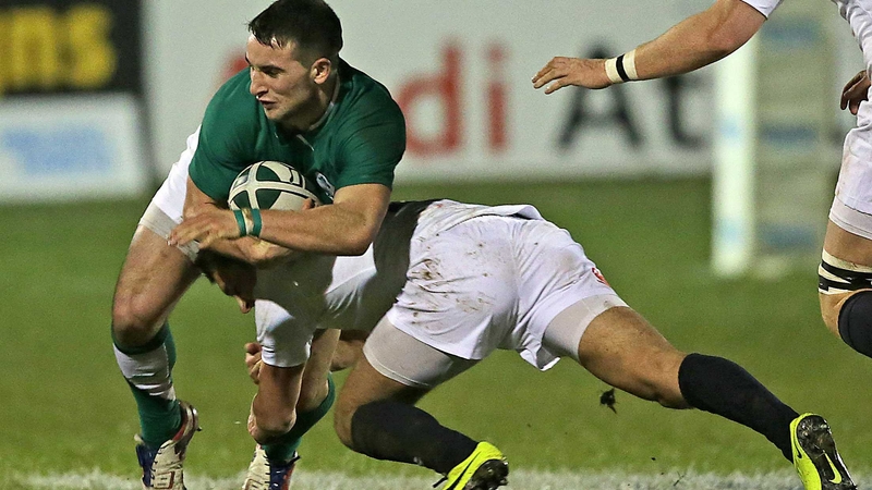 Ireland's Mark Roche is tackled by Henry Slade