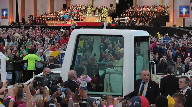 Pope Benedict waves to thousands of pilgrims in Hyde Park, London, in September 2010, during the first state visit to the UK by a Pontiff