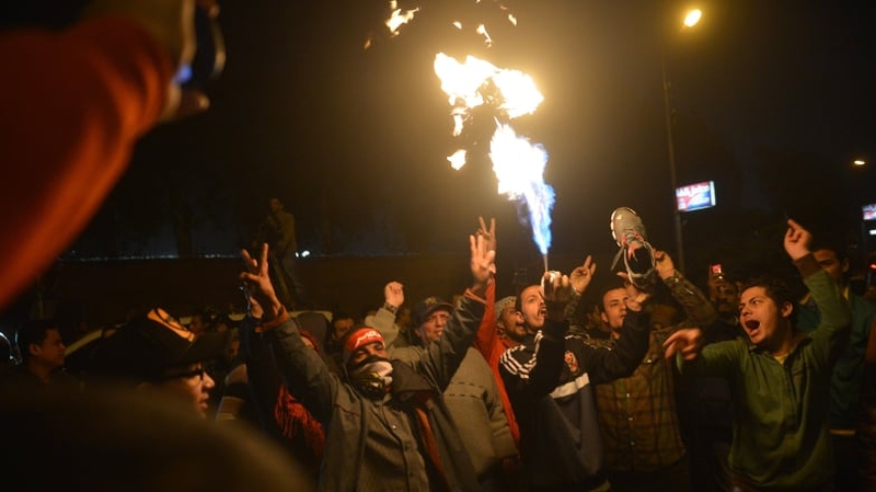 Some protesters broke out in chants, while others responded by throwing stones