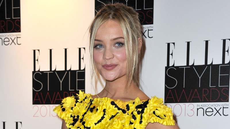 Laura Whitmore rocked the red carpet in a black and yellow mini dress