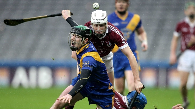 PJ Rowe of St. Gabriels goes down under a challenge from Clara's Lester Ryan