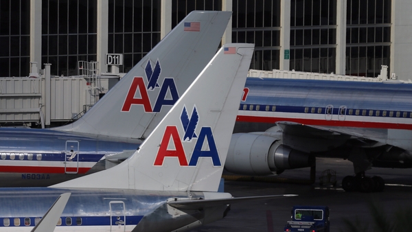 Proposed merger of American Airlines and US Airways to create the world's largest airline faces challenge from US government