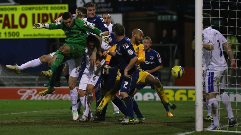 Matt Smith heads home Oldham's last gasp leveller