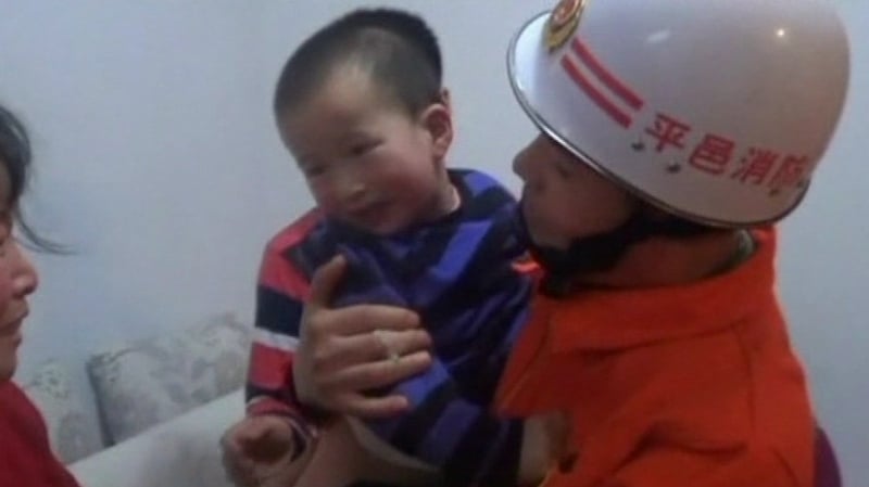 After the girl was handed back into her mother's arms by fire-fighters, she said "thank you" to her rescuers