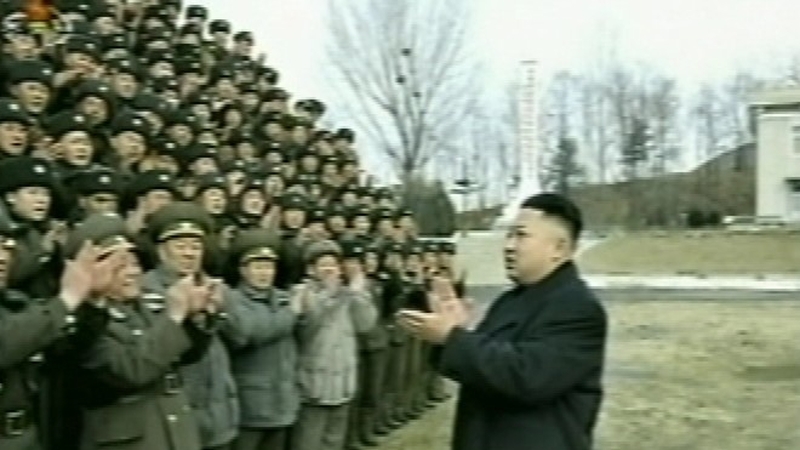 State television showed Kim Jong-un addressing the troops at an unknown location