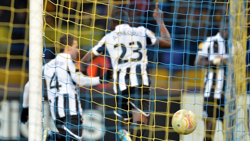 Shola Ameobi celebrates after scoring against Metalist Kharkiv