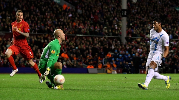 Zenit's Hulk scores the opening goal past Liverpool goalkeeper Pepe Reina