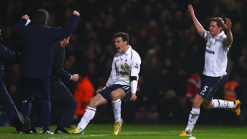 Gareth Bale races to the bench to celebrate his winner