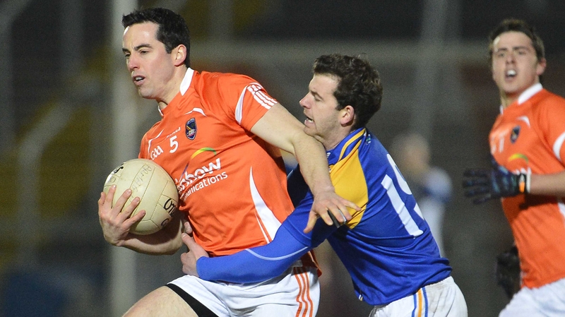 Armagh's Aaron Kernan attempts to evade persistent Longford star Aidan Rowan