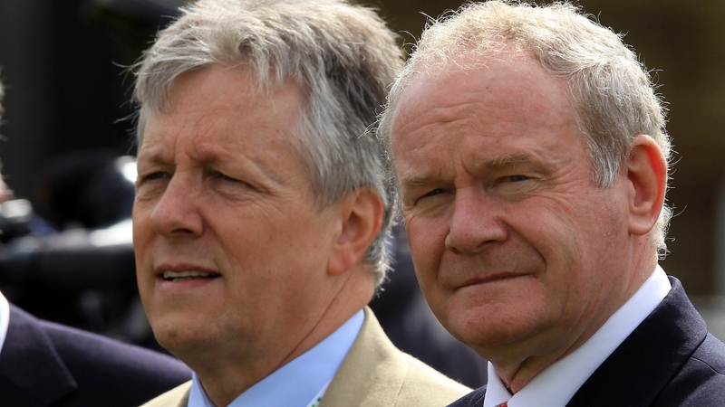 Martin McGuinness (R), pictured with Peter Robinson, says he will defend the peace process from attack from whatever quarter