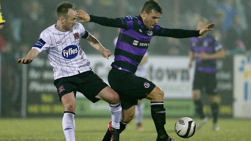 Dundalk's Stephen O'Donnell vies for posession with Rovers' James Chambers