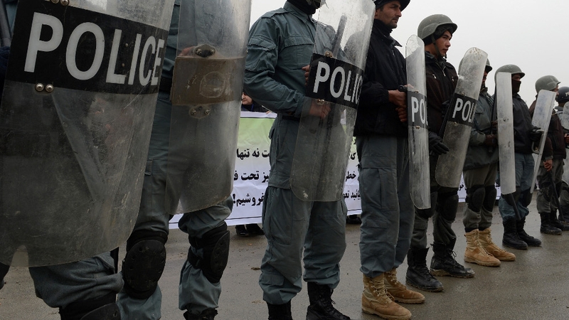 An Aghan police officer is reported to have opened fire inside a police station