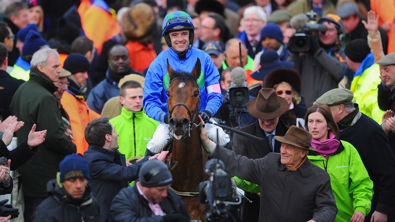 Hurricane Fly and Ruby Walsh celebrate Champion Hurdle success at Cheltenham