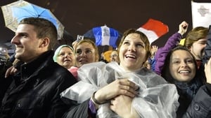 Thousands of people had waited in the cold and rain since Tuesday to see white smoke