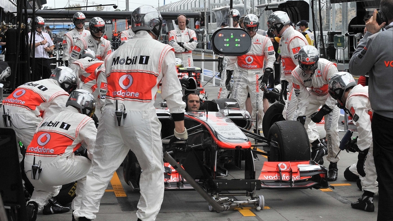 Sergio Perez and the McLarejn team during preparations for the Australian Grand Prix