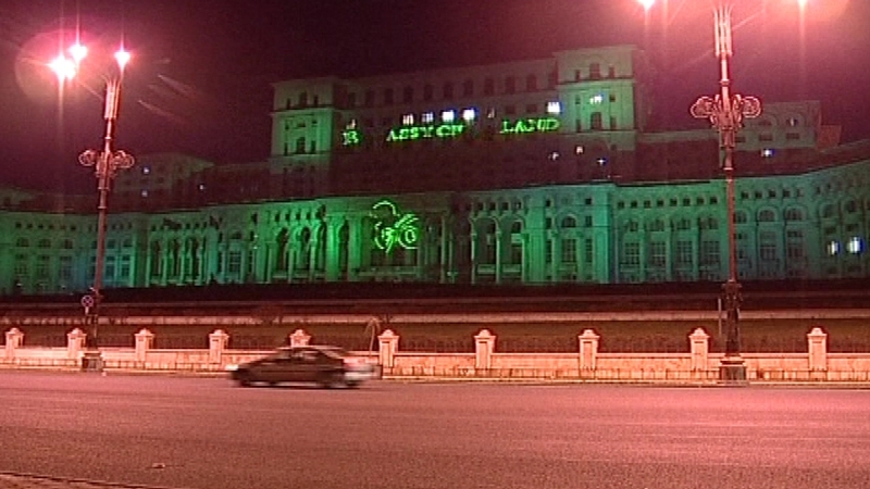 Bucharest's Palace of Parliament is lit up in green