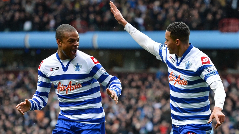 Goalscorer Jermaine Jenas (r) celebrates with QPR team-mate Loic Remy