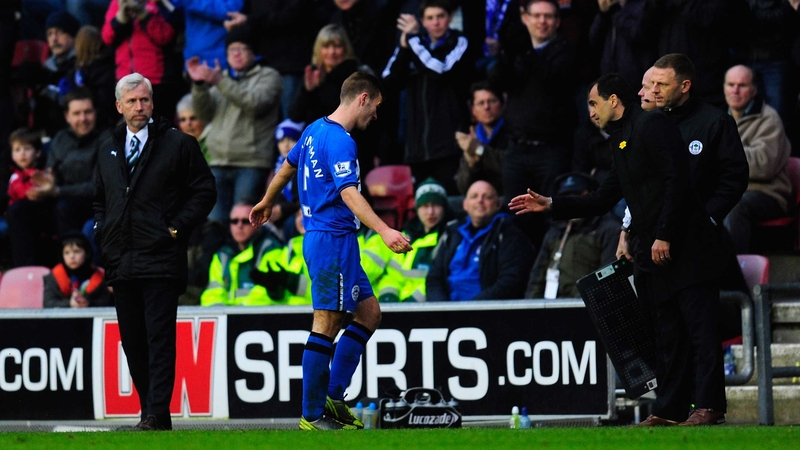 Newcastle boss Alan Pardew fired daggers in the direction of Callum McManaman as he was replaced by Wigan manager Roberto Martínez in the second half of their Premier League encounter