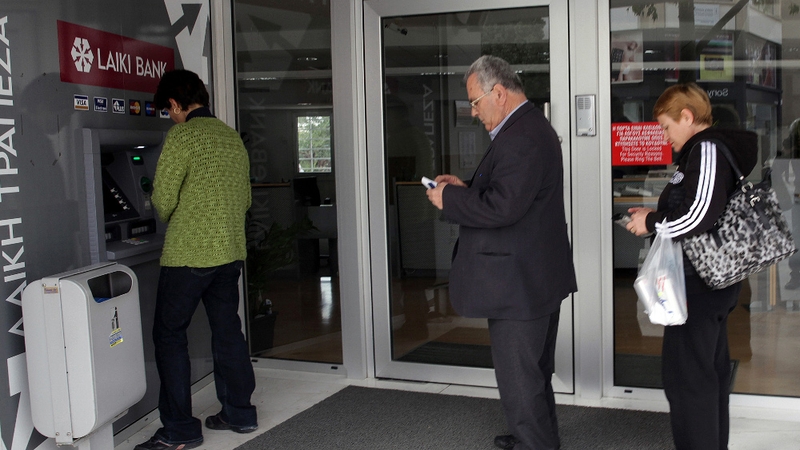 Banks in Cyprus will remain closed until next week but ATMs are still dispensing cash