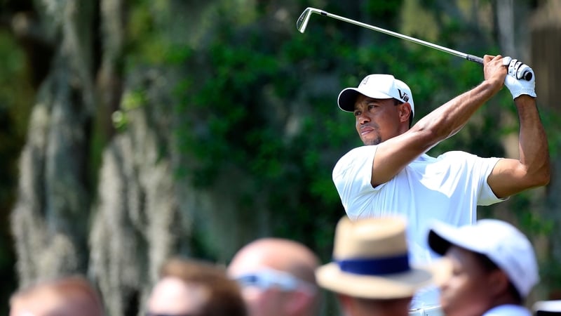 Tiger Woods plays a shot on the fith hole during the third round of the Arnold Palmer Invitational