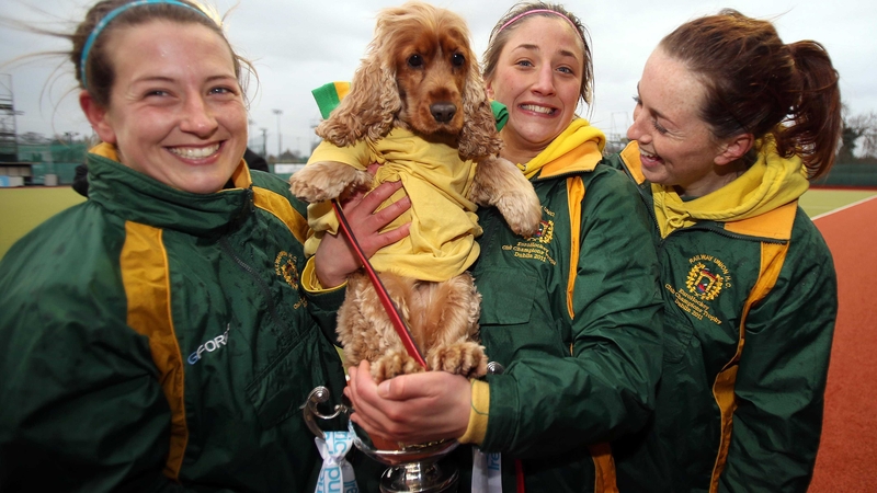 Railway Union players Isobel Joyce, Emma Smyth and Kate McKenna celebrate their with Electric Ireland Irish Senior Cup success with Lolo the dog